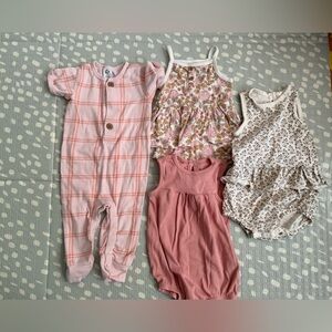 Set of Four Baby Rompers in Pink and Floral Patterns